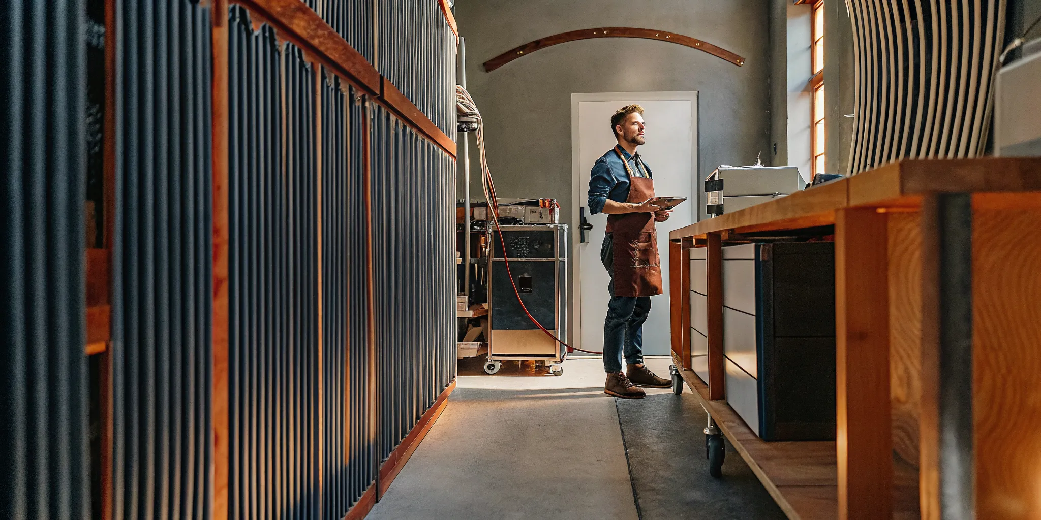 equipment-financing-for-small-businesses-explained-553285 Small business owner reviewing new commercial equipment
