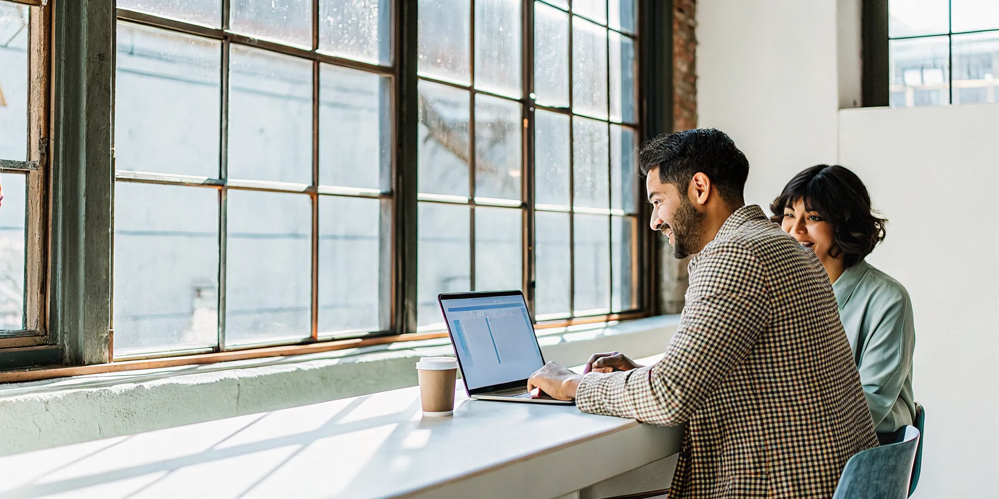 business-cash-advance-for-startups-can-you-qualify-167548 Small business startup owner reviewing financing options on a laptop