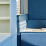 Small business owner reviewing financing documents at a desk
