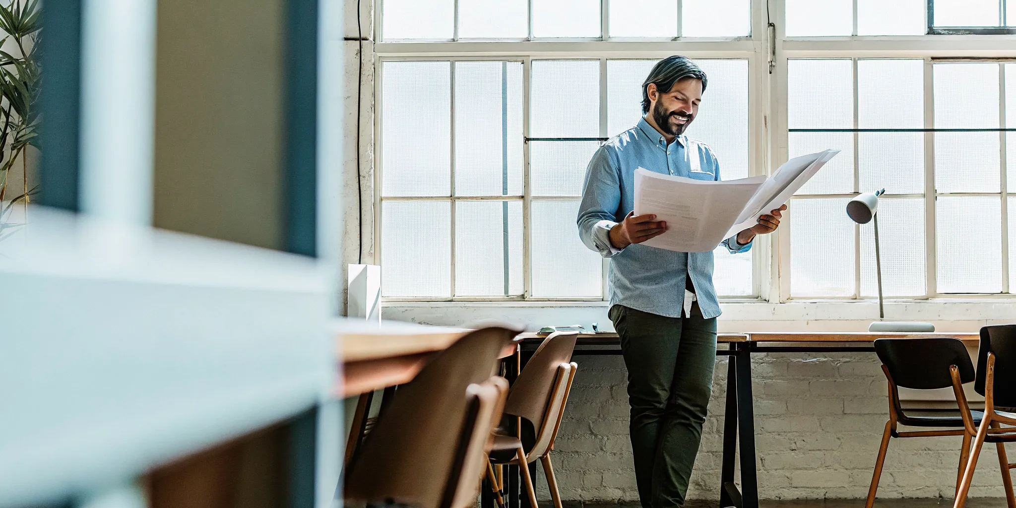 small-business-funding-options-a-complete-guide-to-every-type-227404 Small business owner reviewing financing options with a financing specialist in a modern office