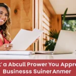 Small business owner reviewing financing documents at a modern desk