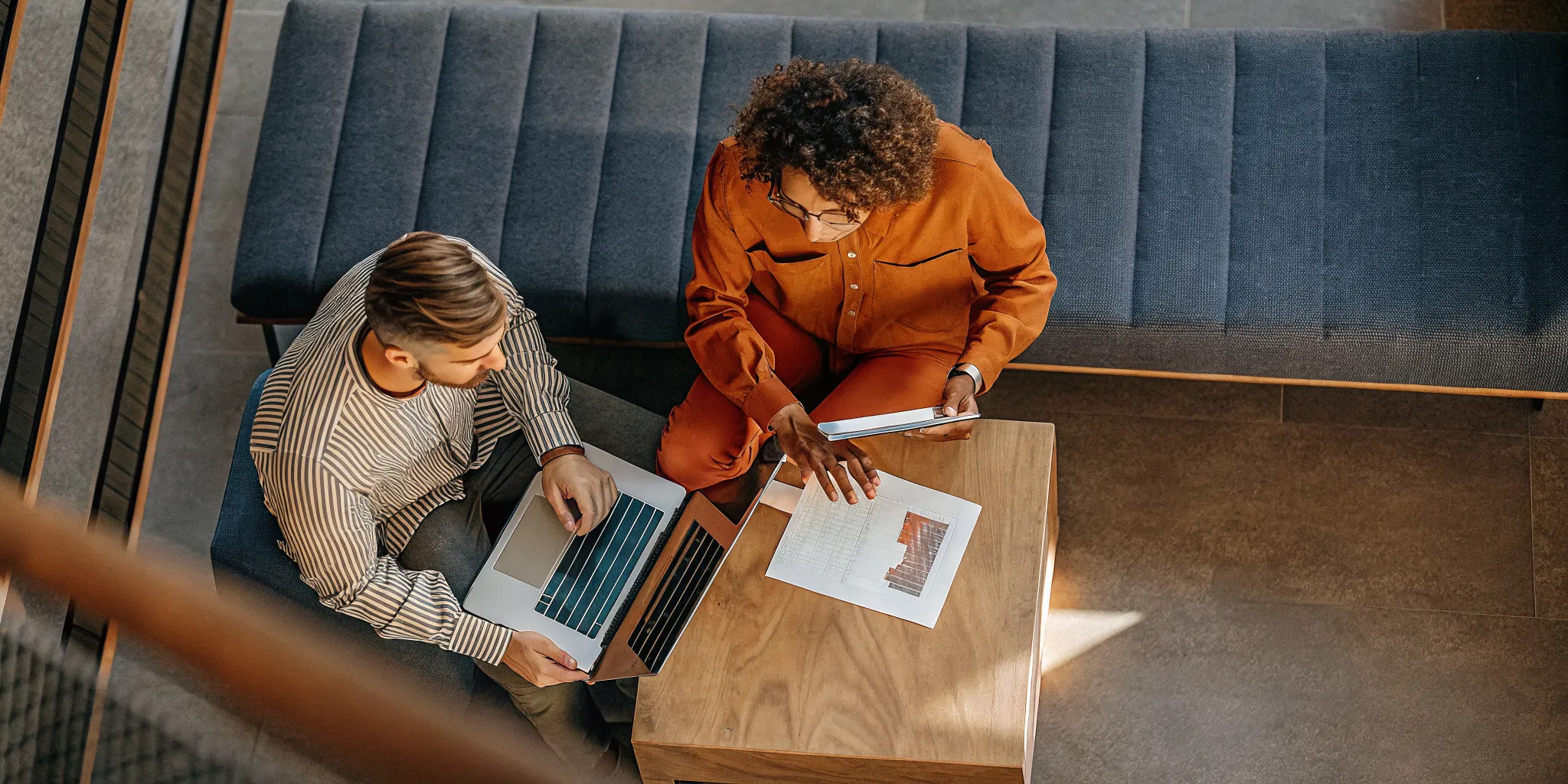 Small business owner comparing a business line of credit and term loan