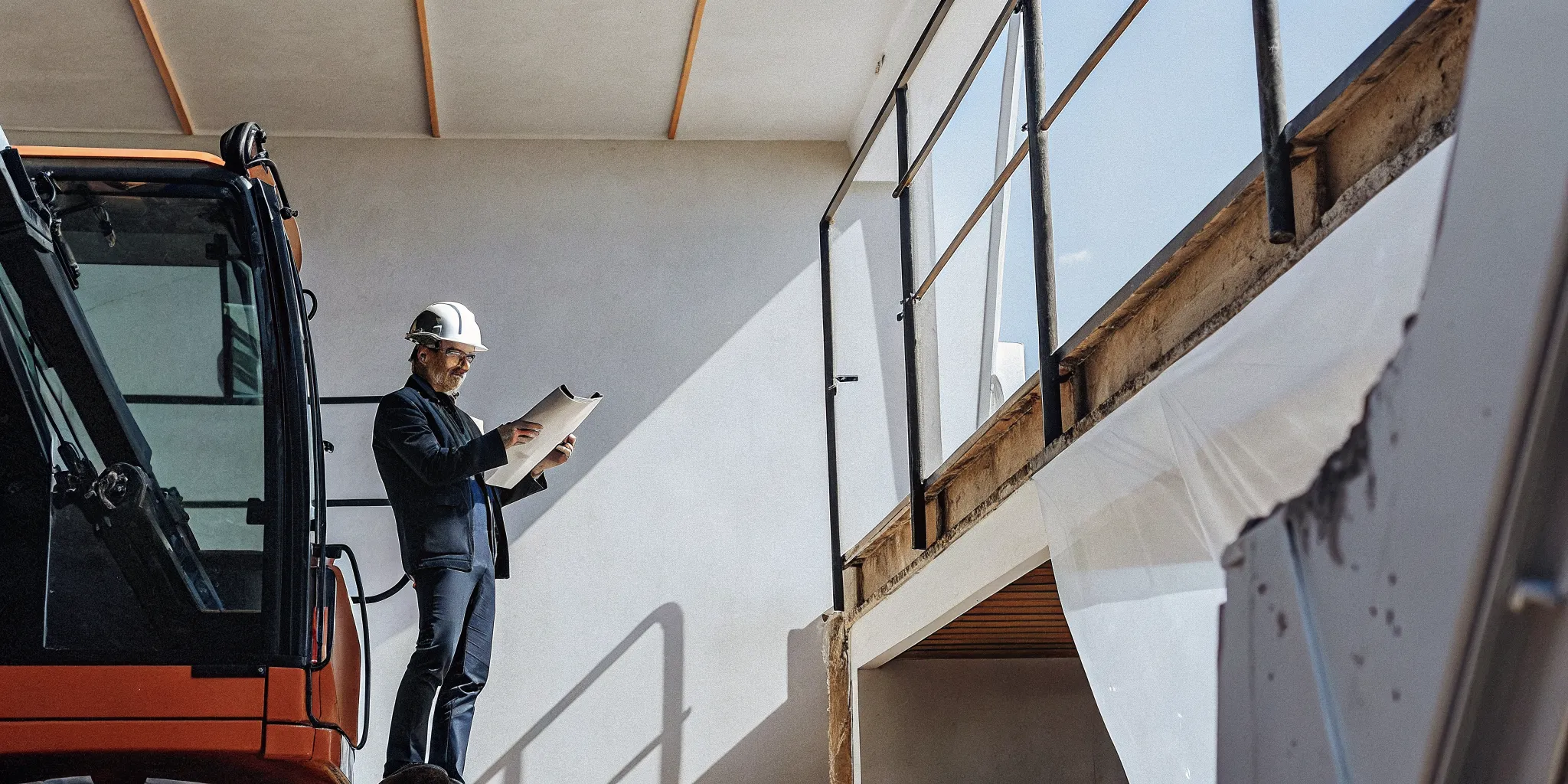 Small business owner reviewing equipment financing requirements and documents